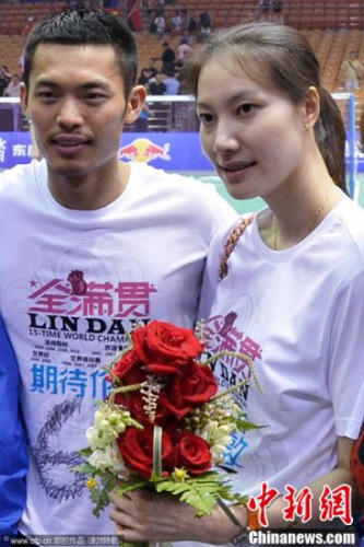 资料图：林丹与谢杏芳。图片来源：Osports全体育图片社。